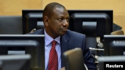 William Ruto sits in the courtroom of the International Criminal Court (ICC) in The Hague, Netherlands, May 14, 2013. 