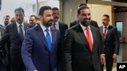 علی الزیدی، نخست‌وزیر عراق، به همراه هیبت حلبوسی، رئیس پارلمان این کشور (آرشیو)