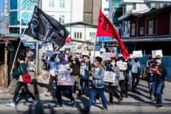 Protesters take part in a demonstration against the military coup during Global Myanmar Spring Revolution Day in Taunggyi, Myanmar, on May 2, 2021.