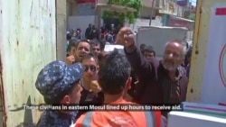 Mosul Residents Clamor for Food as War on IS Grinds On