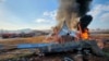 Firefighters douse flames from an aircraft that went off the runway at Muan International Airport in Muan, South Jeolla Province, South Korea, Dec. 29, 2024. 