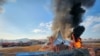 Firefighters douse flames from an aircraft that went off the runway at Muan International Airport in Muan, South Jeolla Province, South Korea, Dec. 29, 2024. 