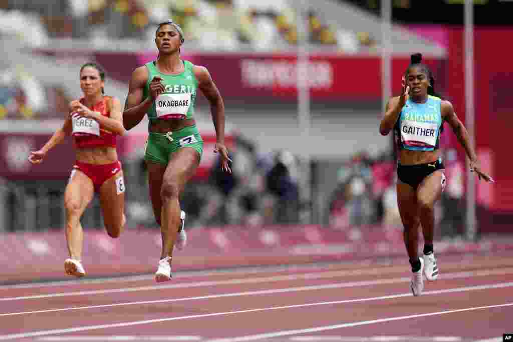 Blessing Okagbare, of Nigeria, wins a heat in the women&#39;s 100-meter run at the 2020 Summer Olympics, Friday, July 30, 2021, in Tokyo. (AP Photo/Petr David Josek)