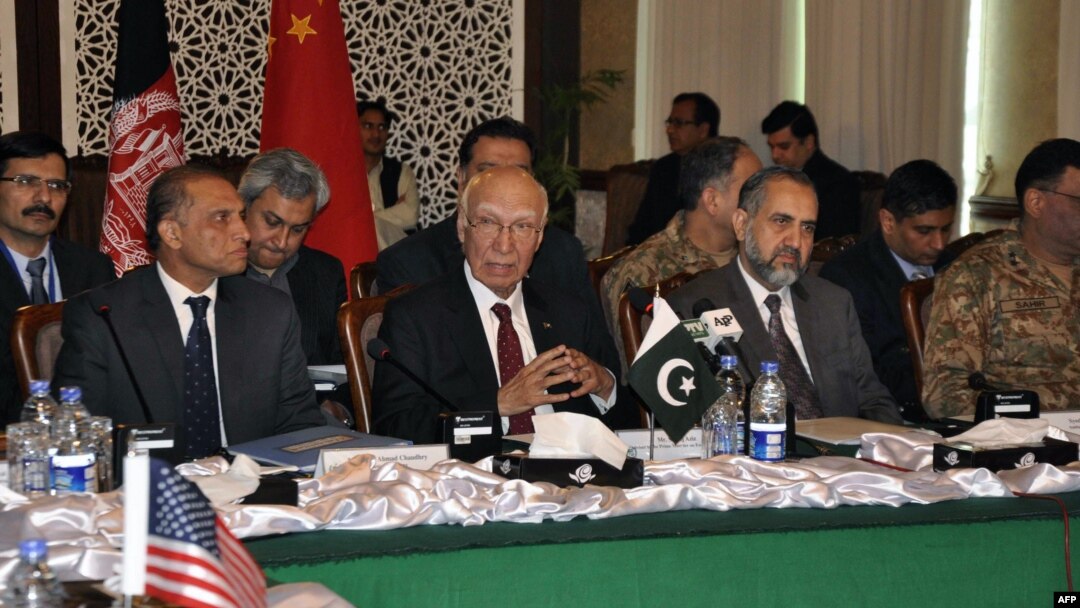 In this handout photograph released by the Associated Press of Pakistan (APP) on February 6, 2016, Pakistani officials chair the third round of four-way peace talks with Afghan, Chinese and U.S. delegates in Islamabad.