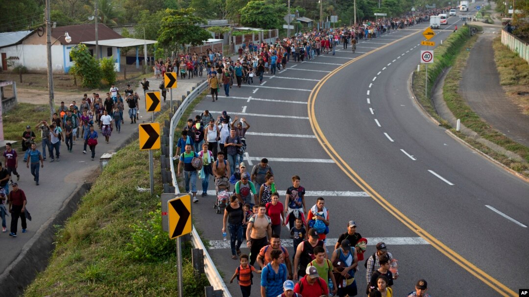 Central American migrants, part of the caravan hoping to reach the U.S. border, walk in Frontera Hidalgo, Mexico, April 12, 2019.