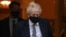 Britain's Prime Minister Boris Johnson leaves from 10 Downing Street in London on Jan. 25, 2022.