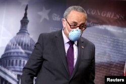 U.S. Senate Minority Leader Chuck Schumer (D-NY) leaves after a news conference on the response to the coronavirus disease (COVID-19) outbreak on Capitol Hill in Washington, May 19, 2020.