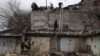 Rescue workers put out a fire in a building that was heavily damaged by a Russian strike on Dnipro, Ukraine, on Nov. 21, 2024. (Ukrainian Emergency Service via AP)