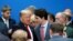 U.S. President Donald Trump talks with Canada's Prime Minister Justin Trudeau during a North Atlantic Treaty Organization Plenary Session at the NATO summit in Watford, near London, Britain, Dec. 4, 2019.