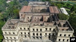 The National Museum stands gutted after an overnight fire in Rio de Janeiro, Brazil, Sept. 3, 2018. 