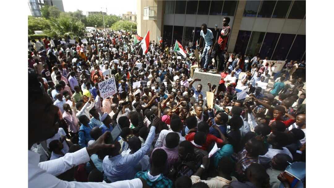 FILE - Protesters rally against police violence in Khartoum, Sudan, Sept. 23, 2019.