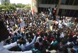 FILE - Protesters rally against police violence in Khartoum, Sudan, Sept. 23, 2019.