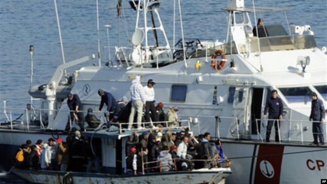An Italian Coast Guard vessel rescues a boatload of would-be migrants believed to be from North Africa in the waters off the Sicilian island of Lampedusa, Italy, (File)