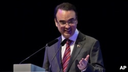 FILE - Philippines Foreign Secretary Alan Peter Cayetano speaks during the opening ceremony of the 50th Association of Southeast Asian Nations (ASEAN) Regional Forum meeting in Pasay city, metro Manila, Philippines, Aug. 5, 2017. 