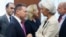 Greece's Finance Minister Yannis Stournaras talks to IMF Managing Director Christine Lagarde (R) during a eurozone finance ministers meeting in Brussels July 8, 2013.