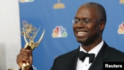 FILE - Andre Braugher poses after winning an Emmy for outstanding lead actor in a miniseries or movie for his work on "Thief" during the 58th annual Primetime Emmy Awards at the Shrine Auditorium in Los Angeles, Aug. 27, 2006.