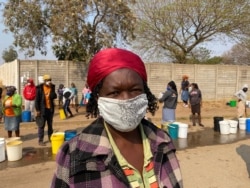 Forty-five-year-old Florence Phiri says residents appreciate that gesture appeals to Clean City to increase the number of bowsers that deliver water to Mabvuku township in Harare, August 20, 2020. (Columbus Mavhunga/VOA)