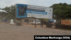 A billboard in Harare, Zimbabwe, encourages people to get vaccinated against cholera, Nov. 13, 2024.