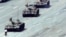 FILE - A Beijing citizen stands in front of tanks on the Avenue of Eternal Peace, June 5, 1989.