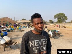 Twenty-three-year-old Chester Musha says he wakes up around 3AM to queue for water or the borehole dries up that day, Harare, Aug. 20, 2020. (Columbus Mavhunga/VOA)