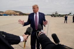 FILE - President Donald Trump talks to reporters before flying to Phoenix, at Andrews Air Force Base, Md., May 5, 2020. The coronavirus pandemic is complicating what has been a May reelection campaign launch for recent presidents.