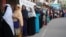 Women stand in a line at a voting center to cast their ballot during the general election in Dhaka, Bangladesh, Dec. 30, 2018.