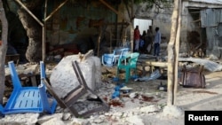 An explosion claimed by a suspected al-Shabab member destroyed this tea shop near a security checkpoint in Mogadishu, Somalia, on Sept. 29, 2023. Somali officials arrested a man believed to be the main arms dealer for al-Shabab militants.