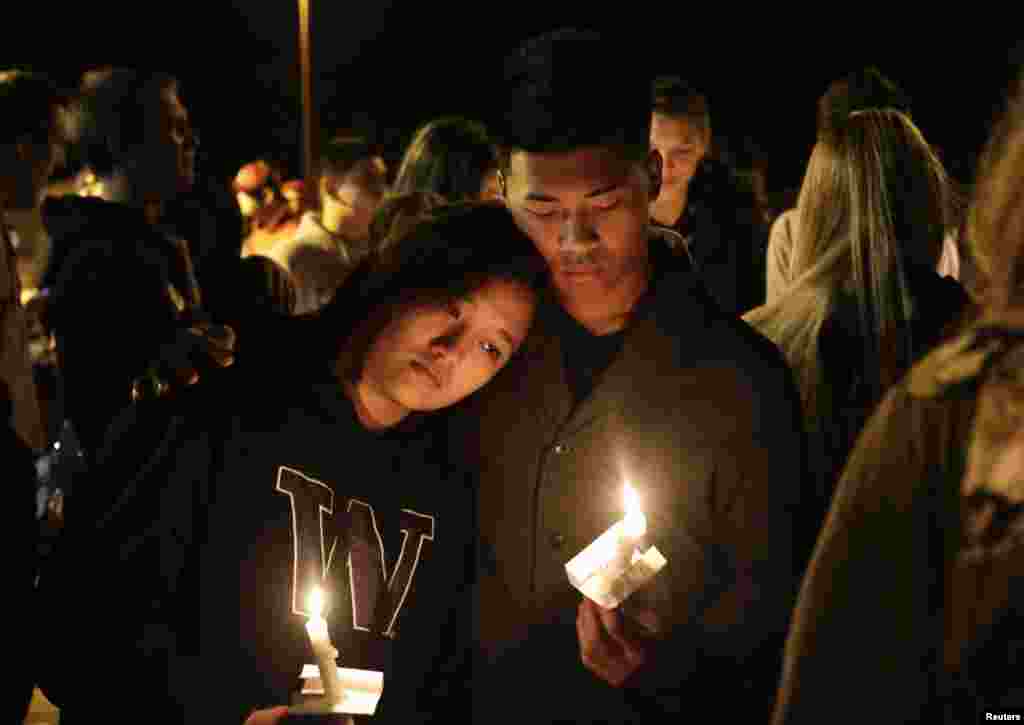 Students and community members attend a vigil at the Grove Church after a shooting at Marysville-Pilchuck High School in Marysville, Washington, Oct. 24, 2014.