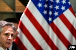 US Secretary of State Antony Blinken speaks during a meeting with former Israeli army chief of staff Gadi Eisenkot and former Israeli Defence Minister Benny Gantz (both not in frame), in Tel Aviv on February 8, 2024