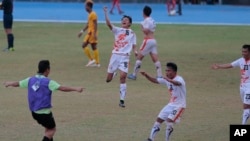 Bhutanese players celebrate the victory over Sri Lanka in their 2018 World Cup qualifier in Colombo, Sri Lanka,Thursday, March 12, 2015.