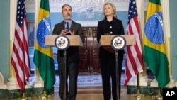 Secretary of State Hillary Rodham Clinton and Brazilian Foreign Minister Antonio de Aguiar Patriota, make remarks after a meeting at the State Department in Washington, Wednesday, June 1, 2011. (AP Photo/Evan Vucci)