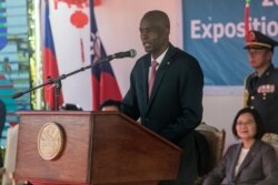 FILE - Haiti's President Jovenel Moise delivers a speech in Port-au-Prince, July 13, 2019.