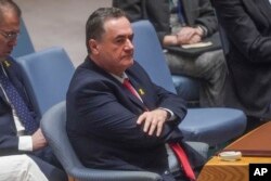 FILE—Israel's Foreign Affairs Minister Israel Katz listens during a meeting of the United Nations Security Council on the war in Gaza, March 11, 2024 at U.N. headquarters.