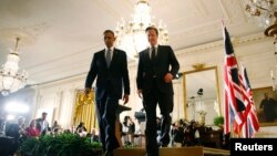 Predsednik Barak Obama i britanski premijer Dejvid Kameron nakon konferencije za novinare u Beloj kući