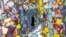 A visitor views the work of artists Gonzalo Duran and Cheri Pann at their Mosaic Tile House in Venice, California, Aug. 26, 2016.   