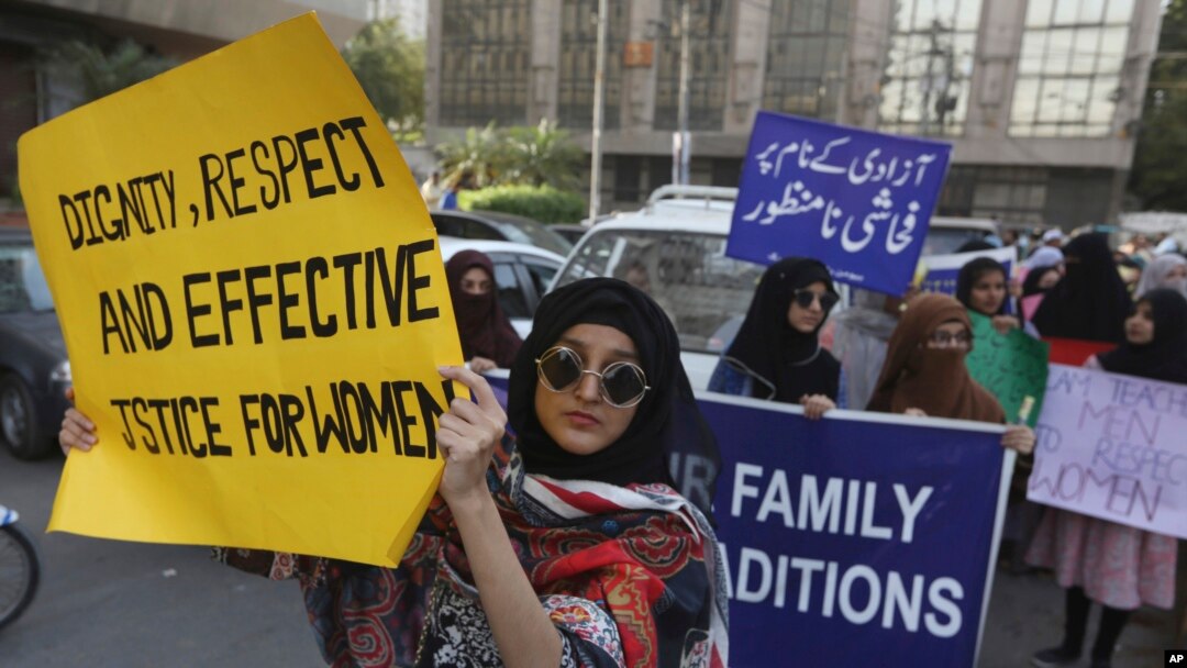 Pakistanis take part in a pro-women rally ahead of International Women's Day, in Karachi, Pakistan, March 6, 2020.