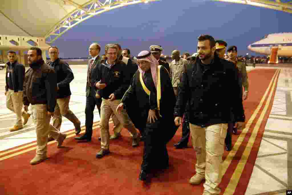 U.S. Defense Secretary Ashton Carter is greeted by Kuwaiti Defense Minister Sheikh Khalid al-Jarrah al-Sabah upon his arrival at Kuwait City International Airport, Kuwait, Feb. 22, 2015.