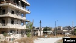 ພາບມຸມໜຶ່ງ ສະແດງໃຫ້ເຫັນ ອັນທີ່ເຊື່ອກັນວ່າ ເປັນເສັ້ນທາງ ທີ່ພວກພົນລະເຮືອນ ນຳໃຊ້ເພື່ອເປັນຈຸດທາງອອກທີ່ປອດໄພ ສຳລັບ ພວກພົນລະເຮືອນ ທີ່ປະສົງຢາກອອກໄປຈາກເຂດ
ປົກຄອງຂອງພວກຕໍ່ຕ້ານລັດຖະບານ, ໃນເຂດ Bustan al-Qasr ຂອງ Aleppo, ປະເທດຊີເຣຍ ວັນທີ 29 ກໍລະກົດ 2016. 