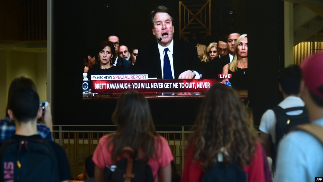 Students at the University of Southern California watch a live telecast of the testimony from Brett Kavanaugh concerning sexual assault allegations from Christine Blasey Ford, Sept. 27, 2018, at the Annenberg School for Communications and Journalism in Los Angeles.