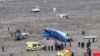 Foto dari drone tampak pesawat milik Azerbaijan Airlines di lokasi kecelakaan di Kota Aktu, Kazakshtan, Rabu, 25 Desember 2024. (Foto: Azamat Sarsenbayev/Reuters)