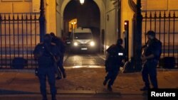 A police van believed to be transporting Moroccan Ayoub El-Khazzani leaves the courthouse in Paris, France, August 26, 2015. 