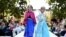 Young models wear two of 2014's hottest Halloween costumes, (from left) Anna and Elsa from Disney's "Frozen" at a Disney Halloween Fashion Show on Oct. 1, 2014, in Glendale, Calif.