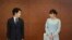 Japan's former Princess Mako, the elder daughter of Crown Prince Akishino and Crown Princess Kiko, and her husband Kei Komuro, look at each other during a press conference to announce their marriage at a hotel in Tokyo, Japan, Oct. 26, 2021. 