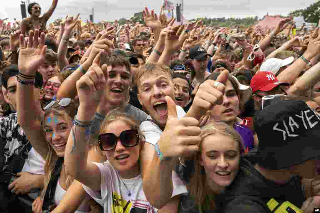 Members of the public are seen at the Reading Music Festival, England.