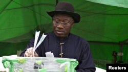 FILE - Nigeria's Goodluck Jonathan is seen as he cast his ballot in his ward at Otuoke, Bayelsa state, March 28, 2015. 