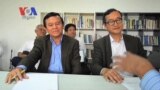 Kem Sokha, left, leader of Human Rights Party sitting alongside with Sam Rainsy, leader of Sam Rainsy Party, in Manila last month. 