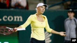 Caroline Wozniacki dikalahkan petenis Spanyol Carla Suarez Navarro dengan skor 7-6, 6-1 (foto: Dok).
