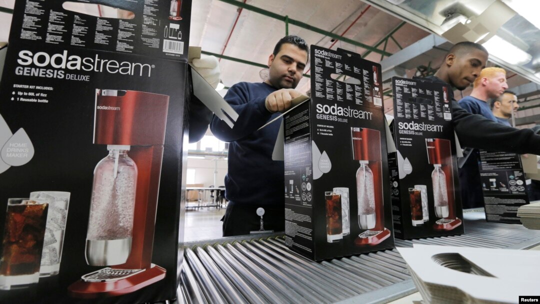 "Soda Stream" xalqaro kompaniyasi ishchilari G'arbiy sohildagi zavodda. 2014-yil yanvar. 