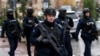 Kosovo Police officers patrol in the streets of Mitrovica, which is ethnically split between Serbs in the north and Albanians in the south, on November 30, 2024, as Kosovo stepped up security measures around critical infrastructure.