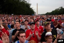 People gather on the National Mall during the "Salute to America" Fourth of July event at the Lincoln Memorial in Washington, July 4, 2019.